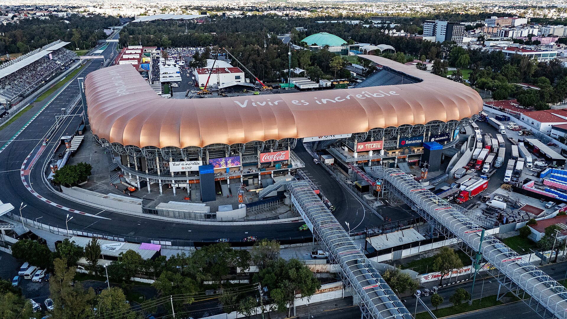Drone view of the Autódromo Hermanos Rodríguez, with the track and the copper-roofed stadium, in Mexico City