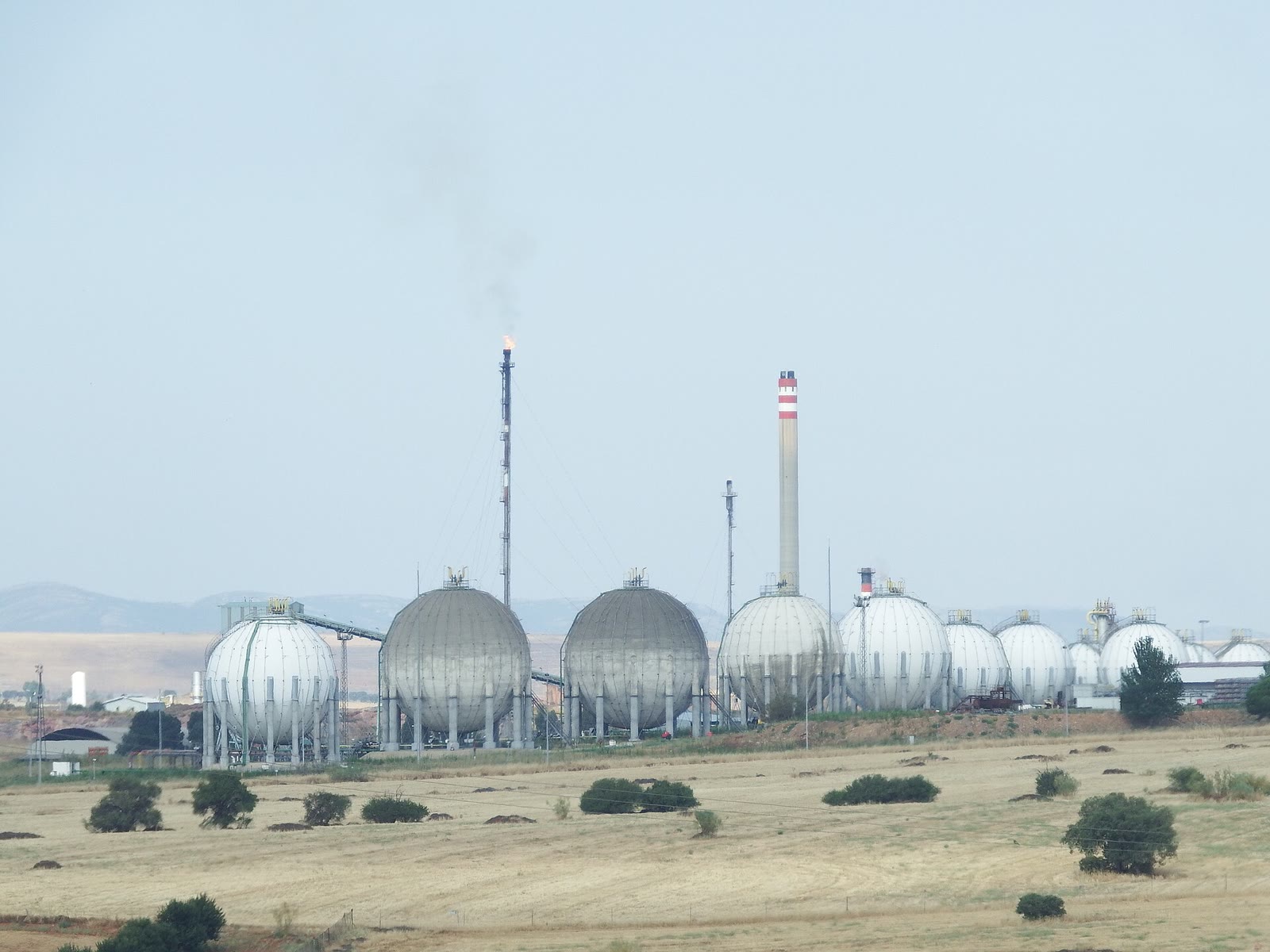 Spherical tanks and chimneys at the Puertollano petrochemical complex, in Ciudad Real